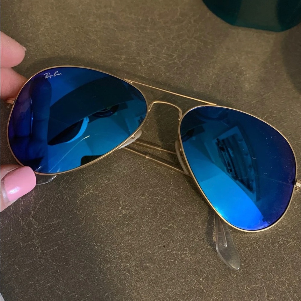 Blue and gold rayban aviators